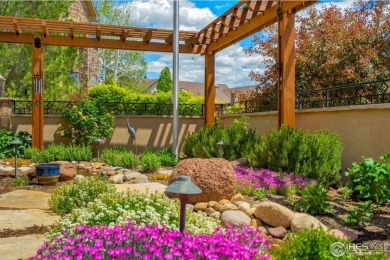 This custom ranch home on a stunning waterfront lot offers an on Pelican Lakes Golf and Country Club in Colorado - for sale on GolfHomes.com, golf home, golf lot