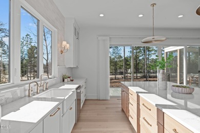 Modern Ranch Farmhouse with Golf Course Views. Built less than on Chapel Ridge Golf Club in North Carolina - for sale on GolfHomes.com, golf home, golf lot