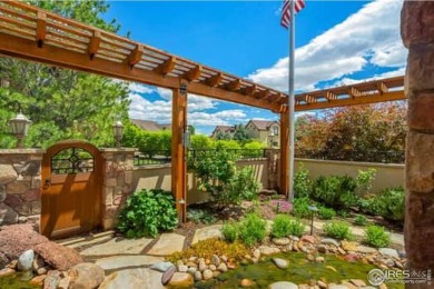 This custom ranch home on a stunning waterfront lot offers an on Pelican Lakes Golf and Country Club in Colorado - for sale on GolfHomes.com, golf home, golf lot