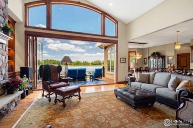 This custom ranch home on a stunning waterfront lot offers an on Pelican Lakes Golf and Country Club in Colorado - for sale on GolfHomes.com, golf home, golf lot