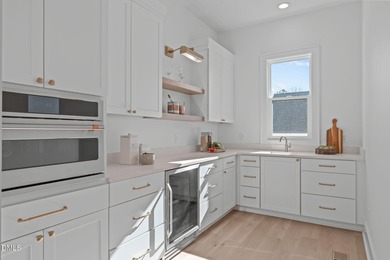 Modern Ranch Farmhouse with Golf Course Views. Built less than on Chapel Ridge Golf Club in North Carolina - for sale on GolfHomes.com, golf home, golf lot