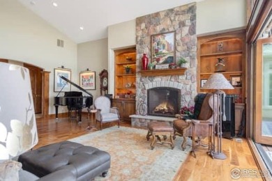 This custom ranch home on a stunning waterfront lot offers an on Pelican Lakes Golf and Country Club in Colorado - for sale on GolfHomes.com, golf home, golf lot