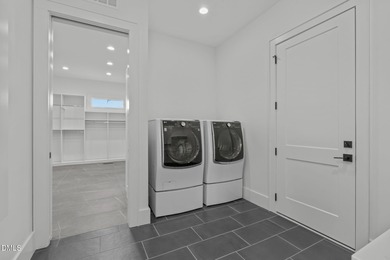 Modern Ranch Farmhouse with Golf Course Views. Built less than on Chapel Ridge Golf Club in North Carolina - for sale on GolfHomes.com, golf home, golf lot