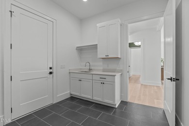 Modern Ranch Farmhouse with Golf Course Views. Built less than on Chapel Ridge Golf Club in North Carolina - for sale on GolfHomes.com, golf home, golf lot