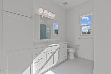 Modern Ranch Farmhouse with Golf Course Views. Built less than on Chapel Ridge Golf Club in North Carolina - for sale on GolfHomes.com, golf home, golf lot