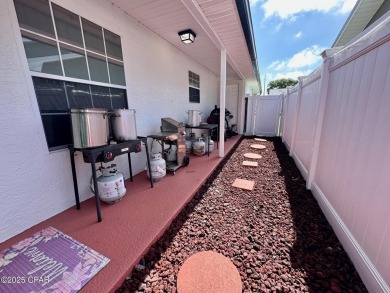 Check out this FANTASTIC BEACH HOUSE with a POOL, huge SUNROOM on Holiday Golf Club in Florida - for sale on GolfHomes.com, golf home, golf lot