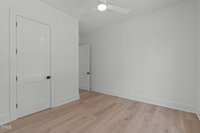 Modern Ranch Farmhouse with Golf Course Views. Built less than on Chapel Ridge Golf Club in North Carolina - for sale on GolfHomes.com, golf home, golf lot