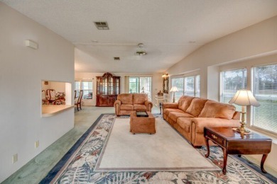 This furnished home is waiting for you to make it yours!   This on Pine Lakes Country Club in Florida - for sale on GolfHomes.com, golf home, golf lot