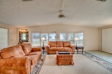 This furnished home is waiting for you to make it yours!   This on Pine Lakes Country Club in Florida - for sale on GolfHomes.com, golf home, golf lot