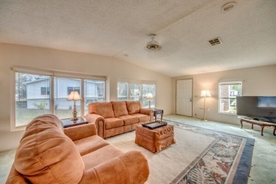 This furnished home is waiting for you to make it yours!   This on Pine Lakes Country Club in Florida - for sale on GolfHomes.com, golf home, golf lot