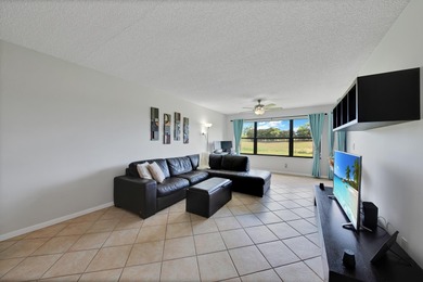 Experience easy living in this beautifully maintained 2-bedroom on Forest Oaks Golf Club in Florida - for sale on GolfHomes.com, golf home, golf lot