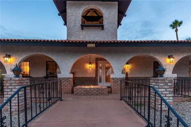 Stunning Santa Fe Estate Overlooking Lake Havasu Golf Course! on London Bridge Golf Course in Arizona - for sale on GolfHomes.com, golf home, golf lot