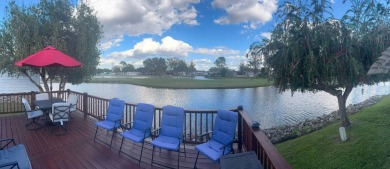 This home has so much to offer it's hard to even decide where to on Golden Lakes Golf Course in Florida - for sale on GolfHomes.com, golf home, golf lot