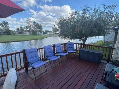 This home has so much to offer it's hard to even decide where to on Golden Lakes Golf Course in Florida - for sale on GolfHomes.com, golf home, golf lot