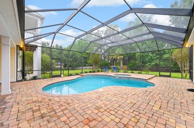 Welcome to this expansive 4-bedroom, 4-bathroom home with over 4 on Haile Plantation Golf and Country Club in Florida - for sale on GolfHomes.com, golf home, golf lot