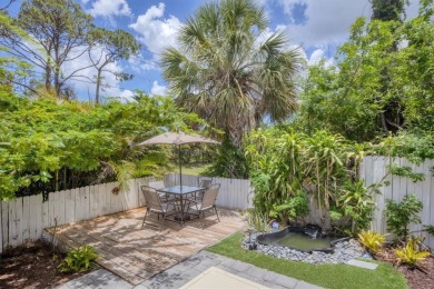 Discover effortless coastal charm in this rare end-unit villa on Rotonda Golf and Country Club The Palms Course in Florida - for sale on GolfHomes.com, golf home, golf lot