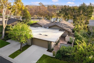 Experience the picturesque park views from this exceptional on Rancho San Joaquin Golf Course in California - for sale on GolfHomes.com, golf home, golf lot