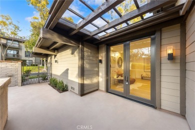 Experience the picturesque park views from this exceptional on Rancho San Joaquin Golf Course in California - for sale on GolfHomes.com, golf home, golf lot