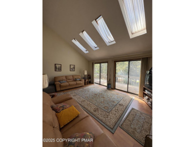 Spacious 3 bedroom home with fireplace and unfinished basement on Pocono Farms Country Club in Pennsylvania - for sale on GolfHomes.com, golf home, golf lot
