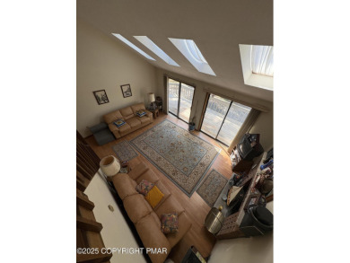 Spacious 3 bedroom home with fireplace and unfinished basement on Pocono Farms Country Club in Pennsylvania - for sale on GolfHomes.com, golf home, golf lot