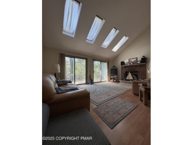 Spacious 3 bedroom home with fireplace and unfinished basement on Pocono Farms Country Club in Pennsylvania - for sale on GolfHomes.com, golf home, golf lot