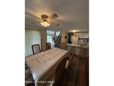 Spacious 3 bedroom home with fireplace and unfinished basement on Pocono Farms Country Club in Pennsylvania - for sale on GolfHomes.com, golf home, golf lot