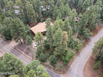Corner lot with views to the Pinetop Country Club Golf Course on Pinetop Lakes Country Club in Arizona - for sale on GolfHomes.com, golf home, golf lot