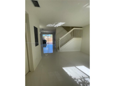 Beautifully remodeled 3BR/2.5BA two-story townhome in the highly on Country Club of Miami in Florida - for sale on GolfHomes.com, golf home, golf lot