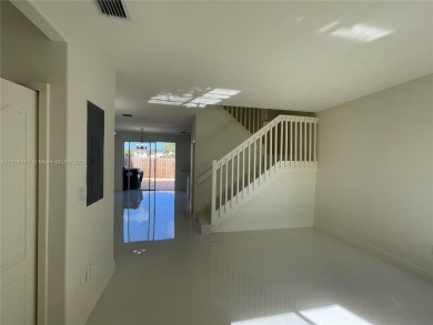 Beautifully remodeled 3BR/2.5BA two-story townhome in the highly on Country Club of Miami in Florida - for sale on GolfHomes.com, golf home, golf lot