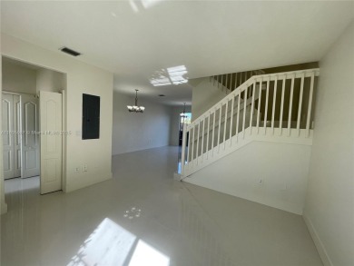 Beautifully remodeled 3BR/2.5BA two-story townhome in the highly on Country Club of Miami in Florida - for sale on GolfHomes.com, golf home, golf lot