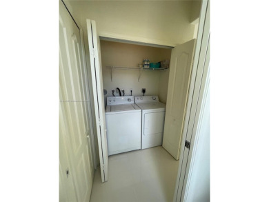 Beautifully remodeled 3BR/2.5BA two-story townhome in the highly on Country Club of Miami in Florida - for sale on GolfHomes.com, golf home, golf lot