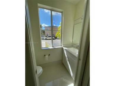 Beautifully remodeled 3BR/2.5BA two-story townhome in the highly on Country Club of Miami in Florida - for sale on GolfHomes.com, golf home, golf lot