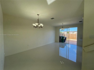 Beautifully remodeled 3BR/2.5BA two-story townhome in the highly on Country Club of Miami in Florida - for sale on GolfHomes.com, golf home, golf lot