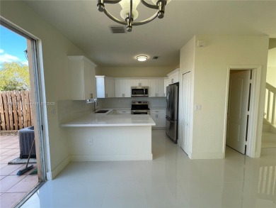 Beautifully remodeled 3BR/2.5BA two-story townhome in the highly on Country Club of Miami in Florida - for sale on GolfHomes.com, golf home, golf lot