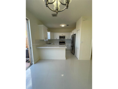 Beautifully remodeled 3BR/2.5BA two-story townhome in the highly on Country Club of Miami in Florida - for sale on GolfHomes.com, golf home, golf lot
