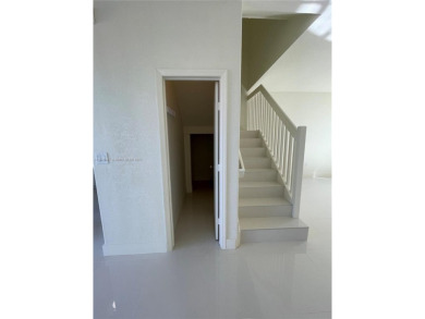 Beautifully remodeled 3BR/2.5BA two-story townhome in the highly on Country Club of Miami in Florida - for sale on GolfHomes.com, golf home, golf lot
