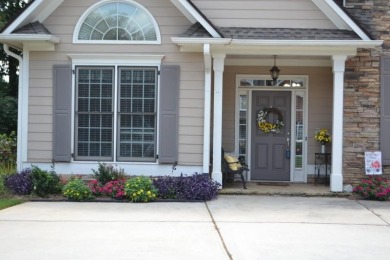 IMMACULATE RANCH HOME WITH FENCED BACKYARD! COVERED FRONT DOOR on The Frog Golf Club in Georgia - for sale on GolfHomes.com, golf home, golf lot