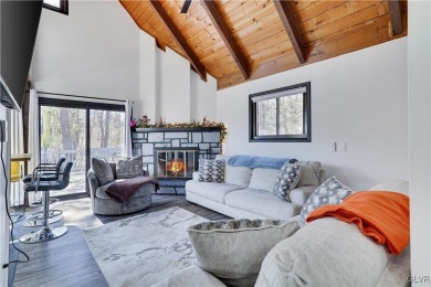 This 3 bed two bath fully remodeled home sits in an Amenity on Pocono Farms Country Club in Pennsylvania - for sale on GolfHomes.com, golf home, golf lot