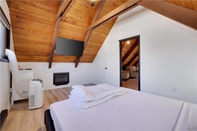 This 3 bed two bath fully remodeled home sits in an Amenity on Pocono Farms Country Club in Pennsylvania - for sale on GolfHomes.com, golf home, golf lot