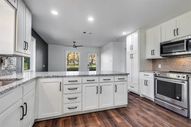 Tucked deep into a grove of Oak trees and adjacent to the Golf on Trophy Club of Dallas in Texas - for sale on GolfHomes.com, golf home, golf lot