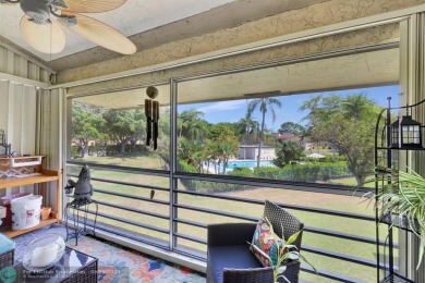 Remodeled 2/2 condo that lives like a home - Impact windows and on Woodmont Country Club in Florida - for sale on GolfHomes.com, golf home, golf lot