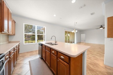 Welcome to this well-maintained 3 bedroom, 2 bath home nestled on Candler Hills Golf and Country Club in Florida - for sale on GolfHomes.com, golf home, golf lot