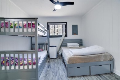 This 3 bed two bath fully remodeled home sits in an Amenity on Pocono Farms Country Club in Pennsylvania - for sale on GolfHomes.com, golf home, golf lot