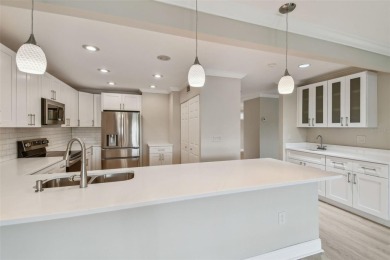 Beautifully renovated townhome in Feather sound Country Club on Feather Sound Country Club in Florida - for sale on GolfHomes.com, golf home, golf lot