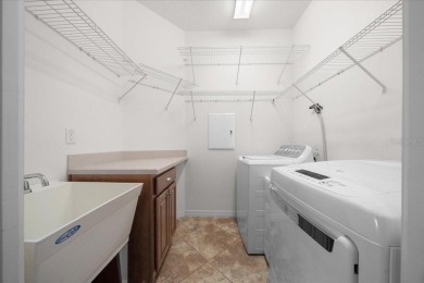 Welcome to this well-maintained 3 bedroom, 2 bath home nestled on Candler Hills Golf and Country Club in Florida - for sale on GolfHomes.com, golf home, golf lot