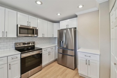Beautifully renovated townhome in Feather sound Country Club on Feather Sound Country Club in Florida - for sale on GolfHomes.com, golf home, golf lot