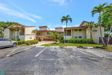 Remodeled 2/2 condo that lives like a home - Impact windows and on Woodmont Country Club in Florida - for sale on GolfHomes.com, golf home, golf lot