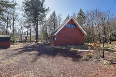 This 3 bed two bath fully remodeled home sits in an Amenity on Pocono Farms Country Club in Pennsylvania - for sale on GolfHomes.com, golf home, golf lot