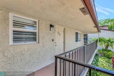 Remodeled 2/2 condo that lives like a home - Impact windows and on Woodmont Country Club in Florida - for sale on GolfHomes.com, golf home, golf lot