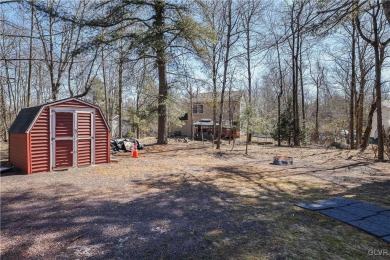 This 3 bed two bath fully remodeled home sits in an Amenity on Pocono Farms Country Club in Pennsylvania - for sale on GolfHomes.com, golf home, golf lot
